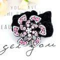 Black velvet hair tie with a pink and white rhinestone floral charm embellishment - Red