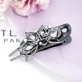 Elegant flower hair claw with black base and sparkling crystals for women's hairstyle - Peacock White