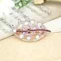 Leaf spring hair clip with purple gradient crystals and white rhinestones on sand - Purple Leaf
