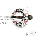 Sparkling pink rhinestone flower hair clip with silver finish for elegant ponytails - Champagne