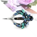Vintage crystal mandala heart hair clip featuring blue rhinestones and green gems - Blue