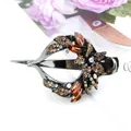 Gun-black hair clip with amber and champagne crystals in a mandala heart shape - Champagne