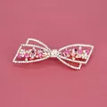 Fermaglio per capelli con fiocco in cristallo rosa, finitura oro rosa e strass - Stile con Intarsi in Strass Rosa / Rosso