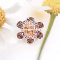 Five-petal flower hair clip with purple rhinestones on a rose gold finish base - Purple