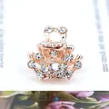 Mini crown hair claw in rose gold finish with shimmering crystals for kids - White