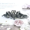 Fermaglio vintage tulipano nero con motivo a cigno e strass in cristallo grigio - Nero