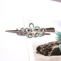 Pinza para el pelo con flores de cristal azul, perlas y base de metal dorado elegante - Azul