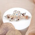 Vintage Haarspange in Gold mit Kristallrose und bernsteinfarbenem Edelstein - Gelb mit Rosenbestickung