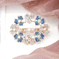 Floral crystal hair clip with blue rhinestones and rose gold base for wedding hairstyles - Three-Petal Flower Blue