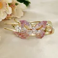 Pink and white crystal butterfly hair claw clip with golden alloy and rhinestone details - Red