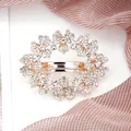 Floral crystal hair clip with rhinestones in rose gold finish for elegant wedding styles - Three-Petal Flower White