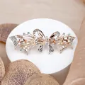 Eleganter roségoldener Haarschmuck mit Kristallen und champagnerfarbenen Steinen - Schmetterling Gelb