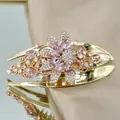 Pinza para el pelo de flor rosa con cristales y pedrería en acabado oro rosa - Rosa