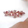 Elegante fermaglio da sposa in oro rosa con cristalli rosa, pietre rosse e perle - Floreale Perla Rosso