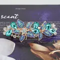 Vintage gold hair clip with multi-tone blue crystals and gradient leaf design - Star Flower Blue