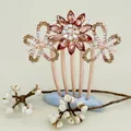Elegant rose gold hair comb with champagne crystal flowers and butterfly design - Champagne