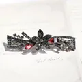 Vintage gunmetal large hair clip with black rhinestones and red drop accents - Gun Black Red Star Flower