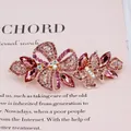 Barrette à cheveux papillon en métal rose doré avec strass et cristaux roses - Papillon Rouge