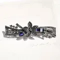 Retro gunmetal large spring hair clip with grey rhinestones and flower centerpiece - Gun Black Blue Star Flower