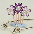 Elegant rose gold hair comb featuring purple gemstone flower and crystal butterfly accents - Purple