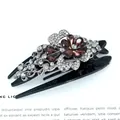 Elegant flower hair clip with brown crystals and white rhinestones on a black base - Red Butterfly Flower