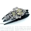 Elegant black hair claw clip featuring champagne and silver rhinestones in a flower shape - Yellow Butterfly Flower