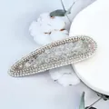 Sparkling silver teardrop hair clip with inlaid white crystals and rhinestones - Teardrop / Transparent White