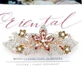 Elegant gold flower hair clip with champagne rhinestones and polished crystal petals - Quicksand