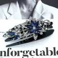 Elegant vintage duckbill hair clip with navy blue rhinestones and silver floral design - Star Blue