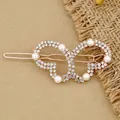 Rose gold interlocking heart hair clip with sparkling rhinestones and white pearls - Butterfly