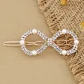 Infinity symbol gold hair clip with sparkling rhinestones and white pearls for women - Double Rings