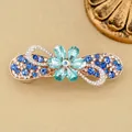 Elegante fermaglio per capelli con fiori di strass blu e base in lega dorata - Stile Fiore / Fiore Blu