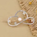 Rose gold heart hair clip with sparkling rhinestones and white pearl detail - Cloud