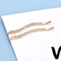 Coppia di forcine ondulate dorate con strass bianchi scintillanti in uno stile minimalista - Ondulato Bianco