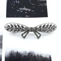 Silver alloy bow hair clip with dark grey rhinestones and elegant hollowed design - Luoxu Series Gray