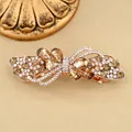 Elegante fermaglio per capelli oro rosa con strass champagne e design a farfalla di cristallo - Stile Fiocco / Petalo Champagne