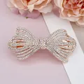 Barrette à cheveux nœud en or rose ornée de strass brillants et design élégant évidé - Blanc Étincelant