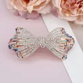 Barrette élégante en nœud doré rose avec strass blancs et colorés brillants - Multicolore Étincelant