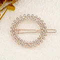 Sparkling rhinestone circular hair clip in gold finish with elegant metal snap closure - Circle White