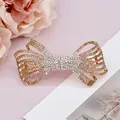 Pince à cheveux noeud avec strass dégradés et placage en or rose élégant - Huang Le Malin