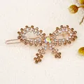 Sparkling champagne gold rhinestone bow hair clip with an iridescent center stone - Yellow Butterfly