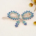 Blue rhinestone bow hair clip with gold metal base and sparkling crystal accents - Butterfly Blue