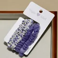 Lot de chouchous en coton floral et tulle lilas sur carte de présentation - Bleu Frais