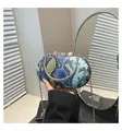 Dettaglio borsa da sera a serpentina con chiusura a fiocco oro e manico - Taglia unica / Blu