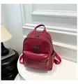 Zaino minimalista in ecopelle bordeaux con borchie metalliche e ciondolo a croce - Taglia unica / Rosso