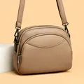 Minimalist beige pebble leather round shoulder bag with multi-layer zipper compartments - One Size / Apricot