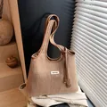 Women's straw tote bag with red stripes and brown leather handles in khaki - One Size / Brown