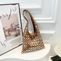 Brown leather Hobo bag with silver metal rivets and a wide shoulder strap in punk style - Brown