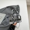 Transparent PVC mini crossbody bag with black white snake print and silver chain - White