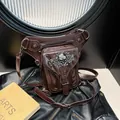 Dark brown punk waist leg bag with silver skull detail and adjustable leather straps - Coffee